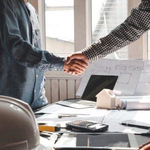 Architect,Man,Shaking,Hands,With,Customer,To,Build,Home,Success